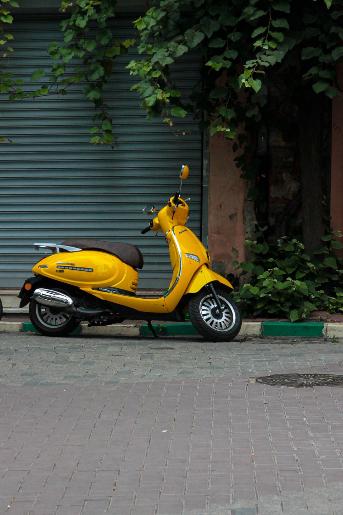 A Vespa-style retro scooter - stylish and photogenic